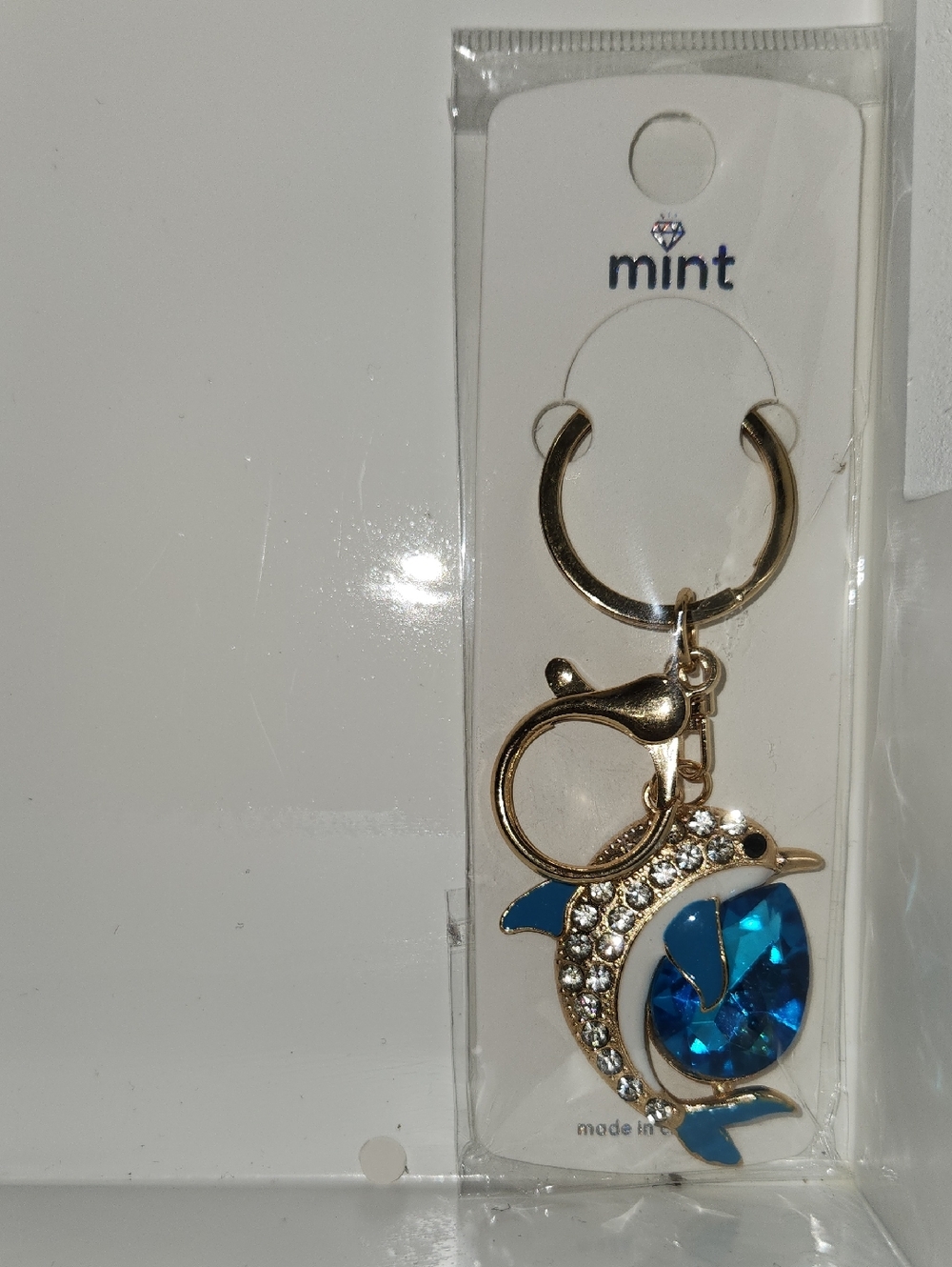 Mint Gold Dolphin Keyring with Blue Crystal Accent